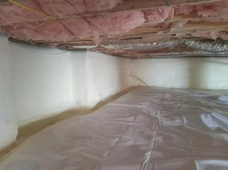 Crawl space encapsulation with closed-cell spray foam for Roof Waterproofing in Spencer
